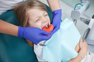 young patient getting PVS impressions
